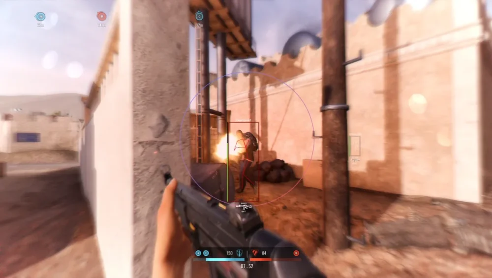 First-person view in a video game, showing a player aiming a gun at an opponent near a sandy wall. The scene is tense with action elements.