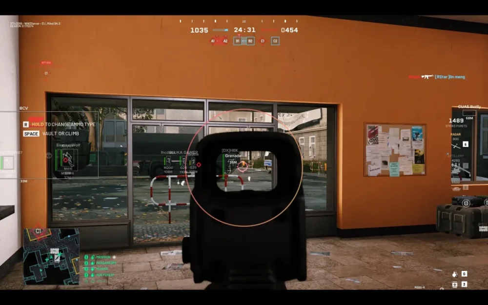 First-person shooter game scene; targeting scope aimed at a glass door, orange wall background, and various game HUD elements visible.