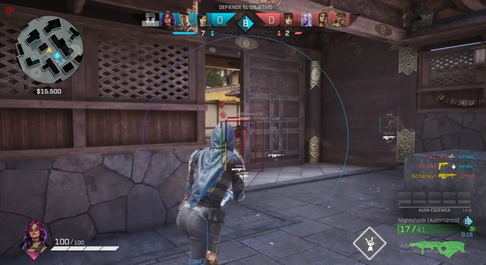 A video game screenshot shows a character aiming at a target in an outdoor courtyard with wooden and stone walls. Top-left radar, ammo, health, and score visible. The tense atmosphere suggests a competitive multiplayer setting.